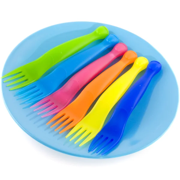 Plastic plate with forks — Stock Photo, Image