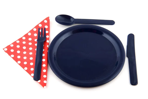 Blauer Teller mit gepunkteter Serviette — Stockfoto