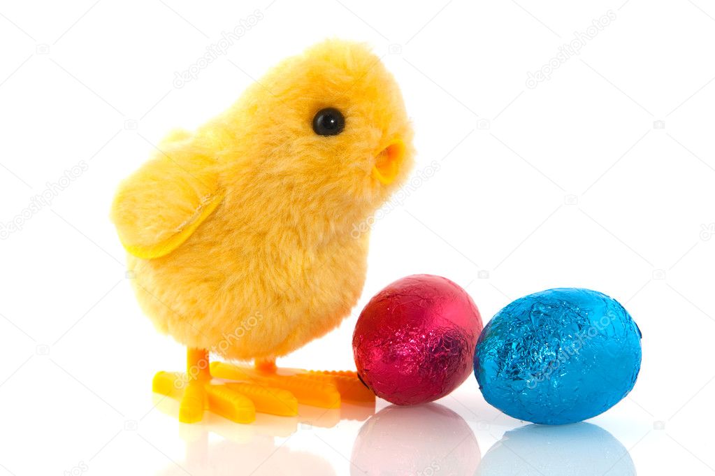 Easter chick with chocolate eggs