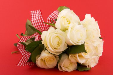 White roses on red clipart