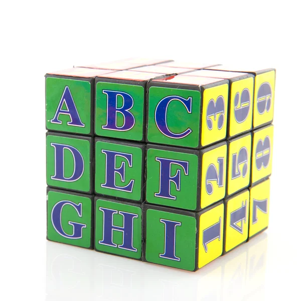 Number and alphabet puzzle — Stock Photo, Image