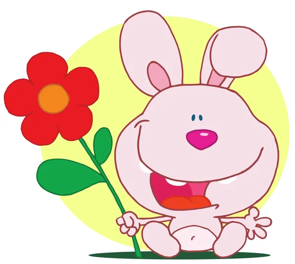Bunny innehar blomma — Stockfoto