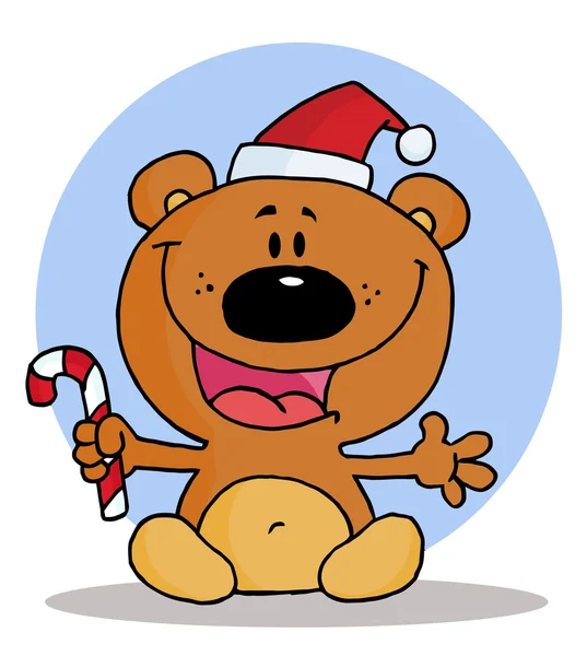 Χαρούμενο αρκουδάκι Χριστουγέννων κρατώντας ένα από ζαχαροκάλαμο καραμέλα — Φωτογραφία Αρχείου