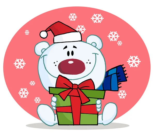 Noel kutup ayısı karda bir hediye tutarak veriyor — Stok fotoğraf