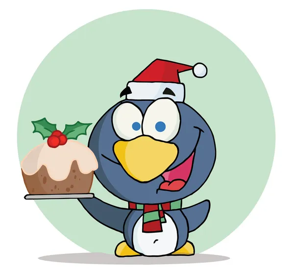Рождественский пингвин с рождественским пудингом — стоковое фото