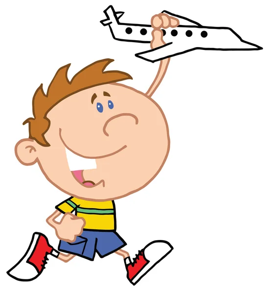 Мальчик играет с самолетом — стоковое фото
