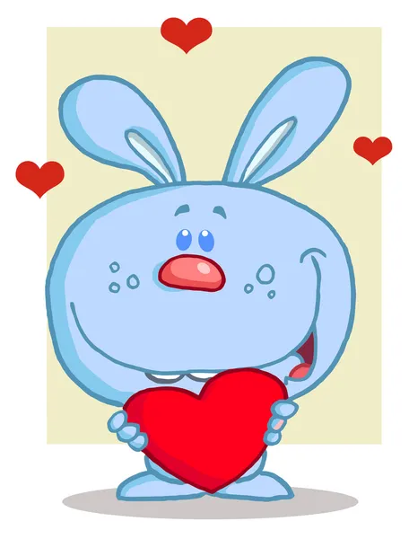 Dulce conejo azul sosteniendo un corazón rojo — Foto de Stock