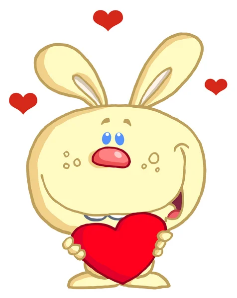 Conejo amarillo romántico con corazón —  Fotos de Stock