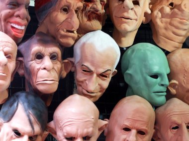 Display of human and animal masks clipart