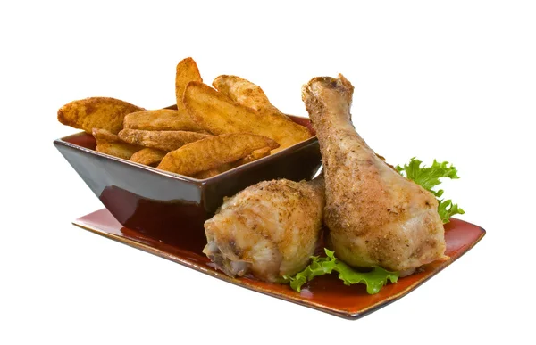 Kycklingklubbor och klyftpotatis — Stockfoto