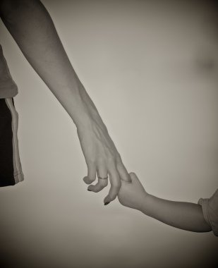 The small daughter holds mum by the hand clipart