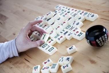 Playing Mahjong clipart