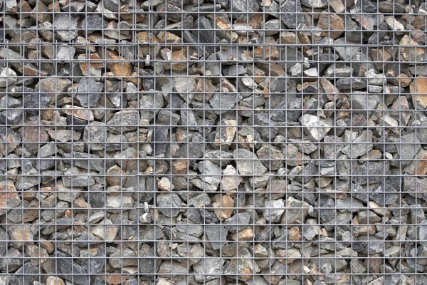 Rock in cage — Stock Photo, Image