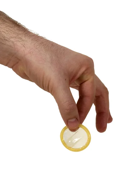 Hand wearing condom — Stock Photo, Image