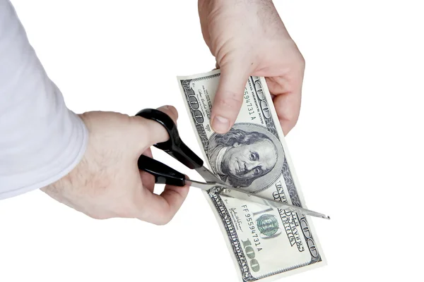 Cutting hundred dollar bill — Stock Photo, Image