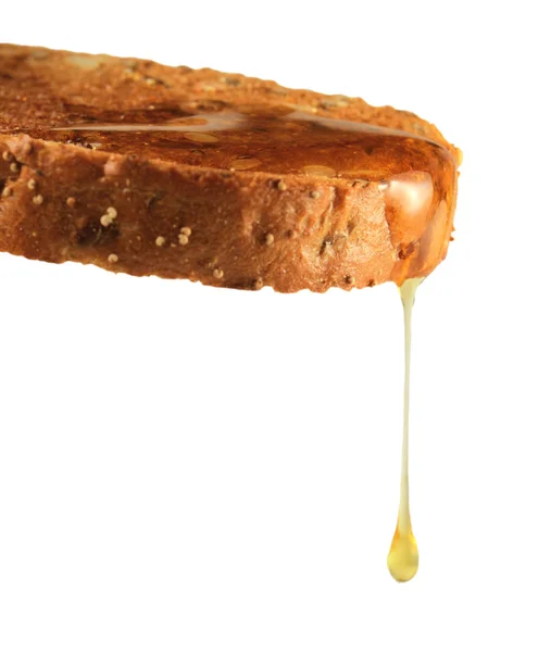 Rostat bröd och honung — Stockfoto