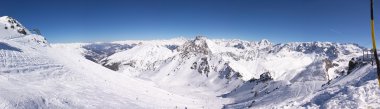 Panoramic view on Alps winter mountains clipart