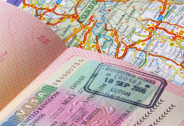 Passport and a road map — Stock Photo, Image