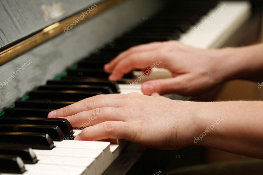 Hands playing piano — Stock Photo © brebca #2229502