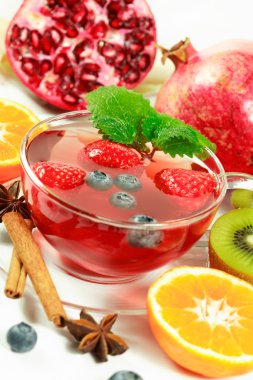 Winter fruit tea with fresh fruits clipart