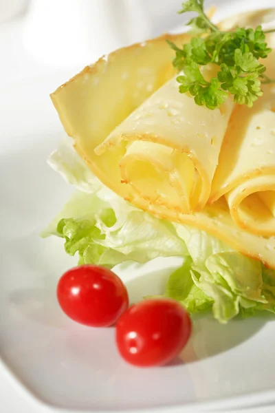 Cheese with salad — Stock Photo, Image