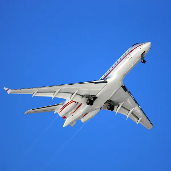 stock image Aeroplane on a blue background