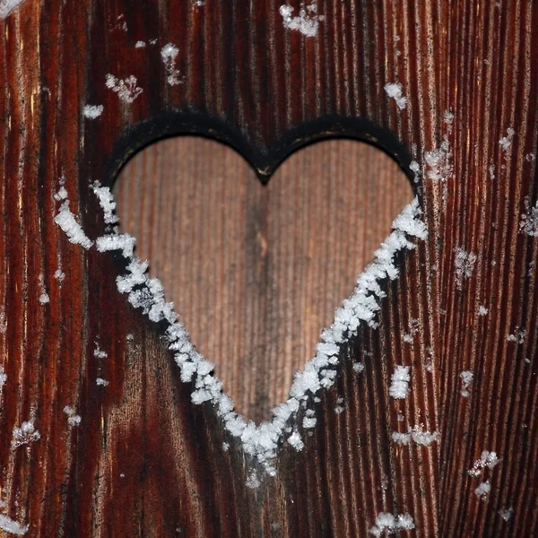 Fondo de madera con copos de nieve — Foto de Stock