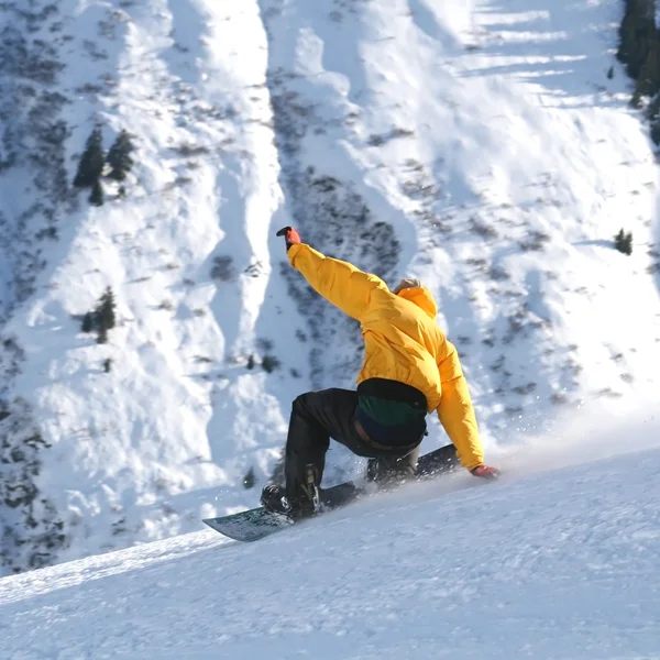 Snowboarder aterragem suavemente — Fotografia de Stock