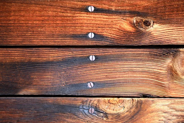 Fondo de madera con tornillos —  Fotos de Stock