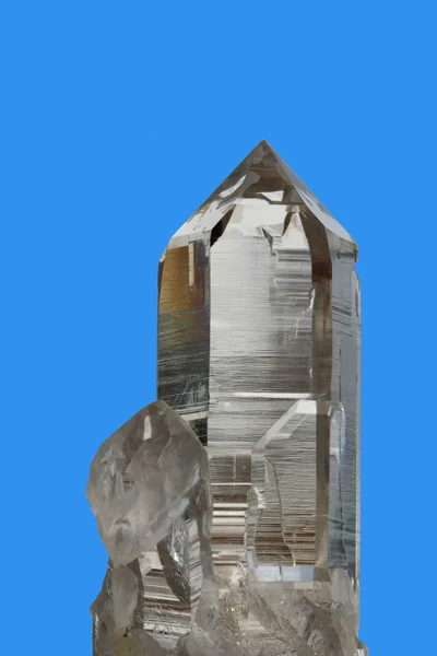 Crystal op blauwe achtergrond Stockfoto