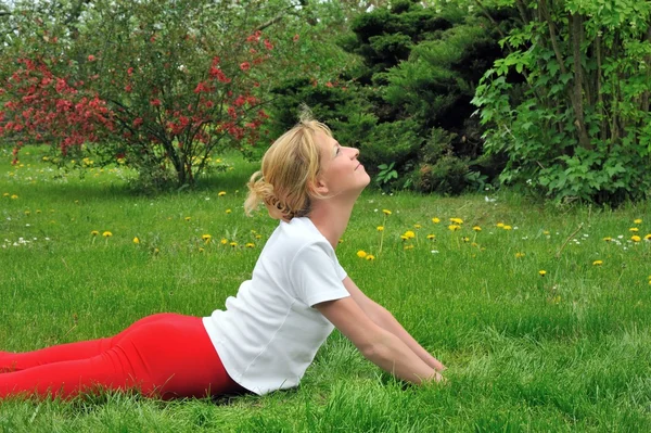 stock image Young woman doing yoga