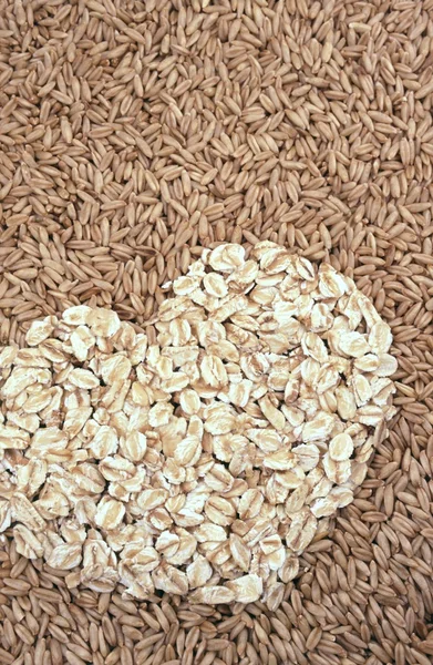 Oats seeds and oat-flakes heart