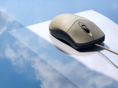 Gray computer mouse with cable... clipart