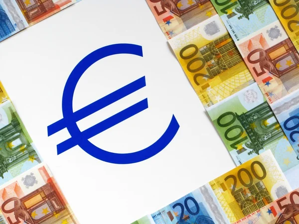 Pieniądze euro i znak — Zdjęcie stockowe