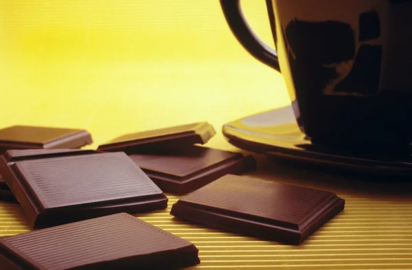 Bar of chocolate and hot chocolate — Stock Photo, Image