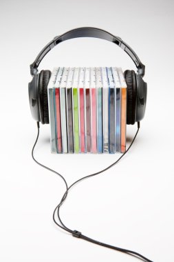 Headphones on cd's clipart