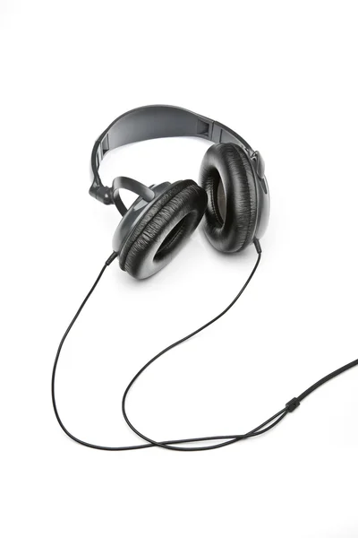 Black headphones on white — Stock Photo, Image