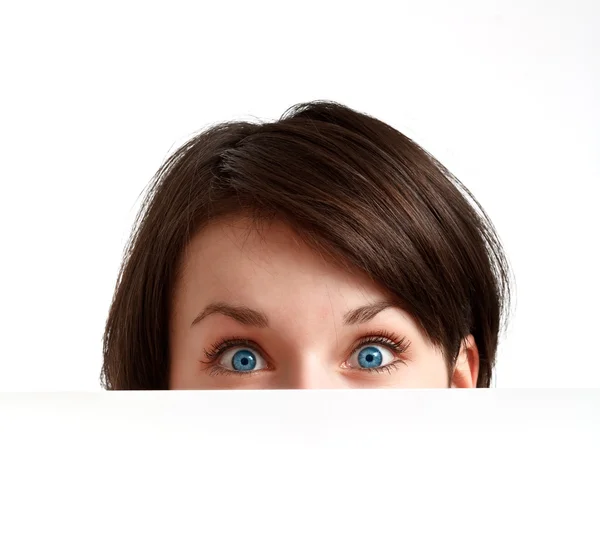 Cara parcialmente oculta con grandes ojos azules — Foto de Stock