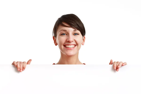Dívka drží prázdná bílá deska — Stock fotografie