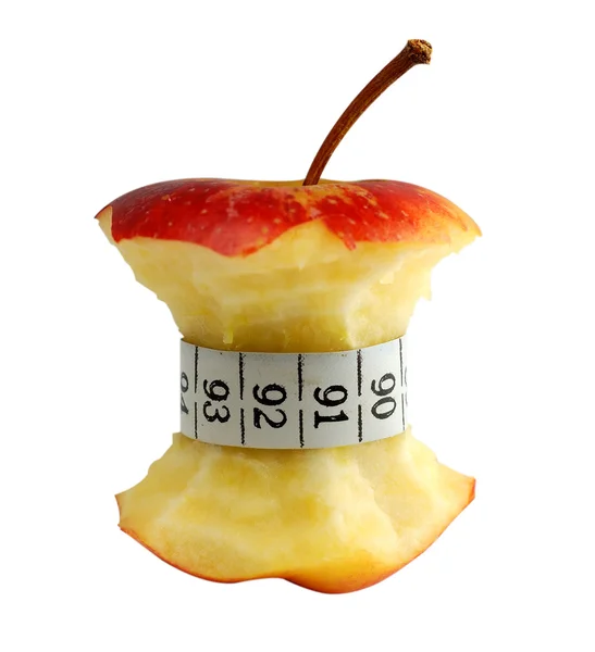 Jabłko i taśma pomiarowa — Zdjęcie stockowe