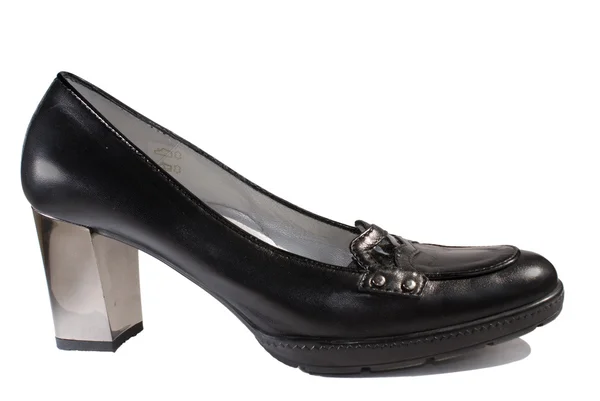 Black shoe on high mirror heel — Stock Photo, Image