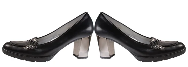 Black shoes on high mirror heel — Stock Photo, Image