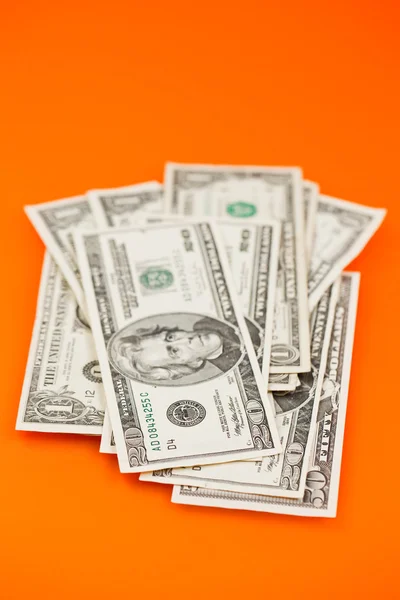 Dollar auf farbigem Hintergrund — Stockfoto