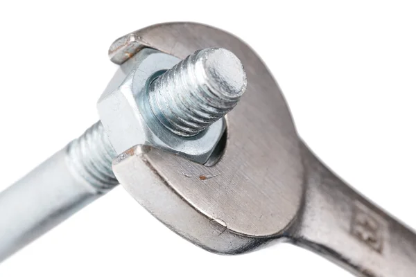 Chrome spanner with nut and bolt — Stock Photo, Image