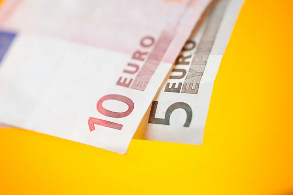 Euros sobre fundo de cor — Fotografia de Stock