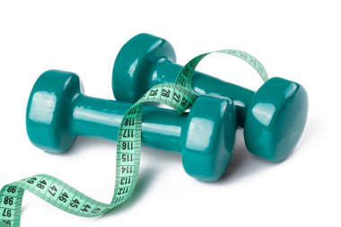 Green dumbell with measuring tape clipart