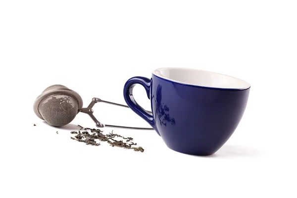 Green tea , tea strainer and cup — Stock Photo, Image