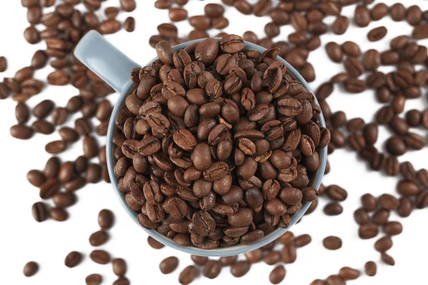 Kaffeebohnen und Kaffeetasse — Stockfoto