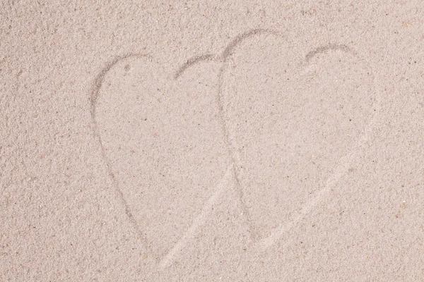 Corações na areia — Fotografia de Stock