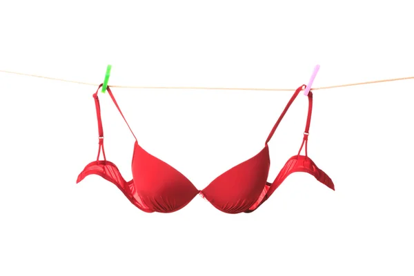 Bra hanging on clothes line — Stock Photo, Image